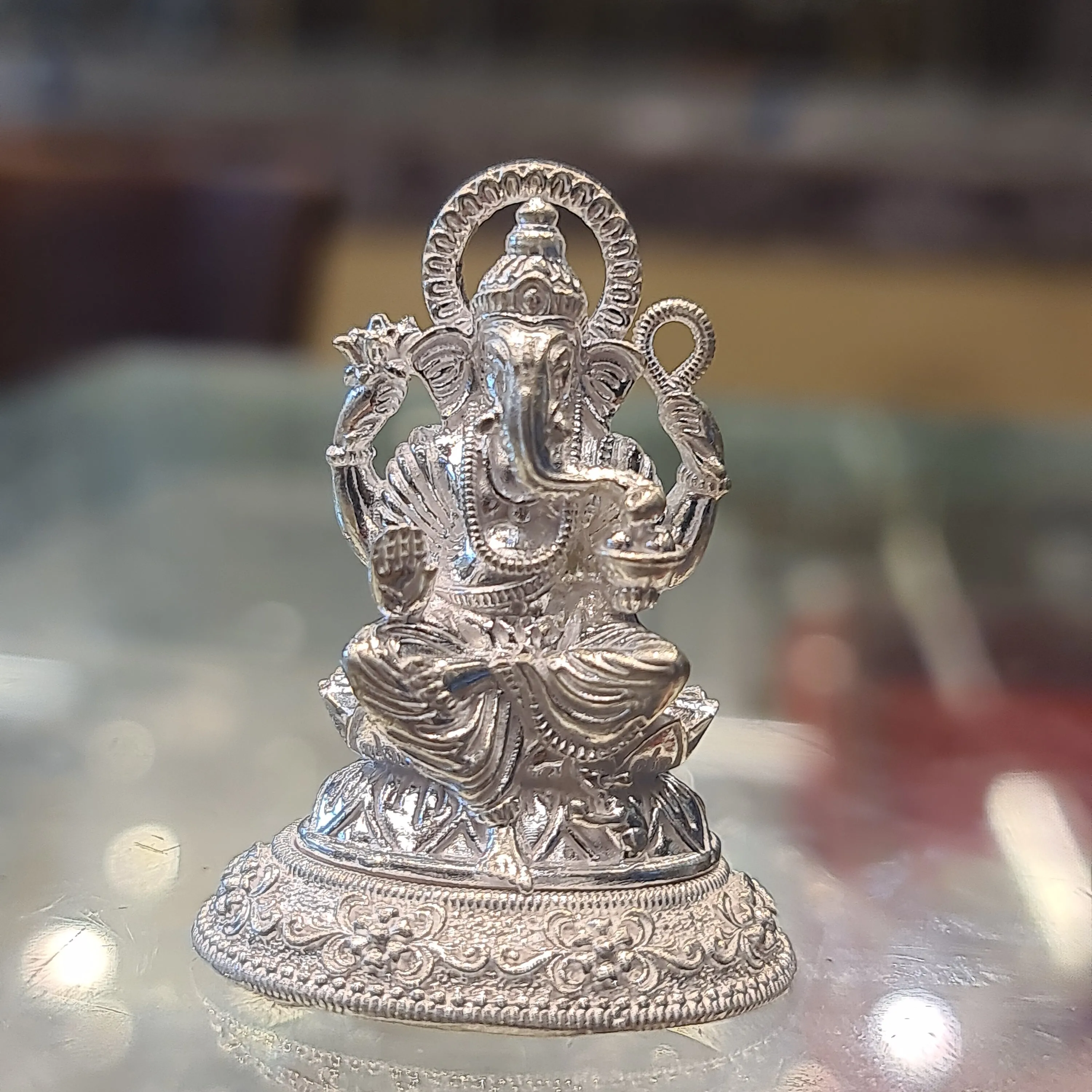 "Bringing Good Fortune Home: The Majestic Silver Lord Ganesha Idol"