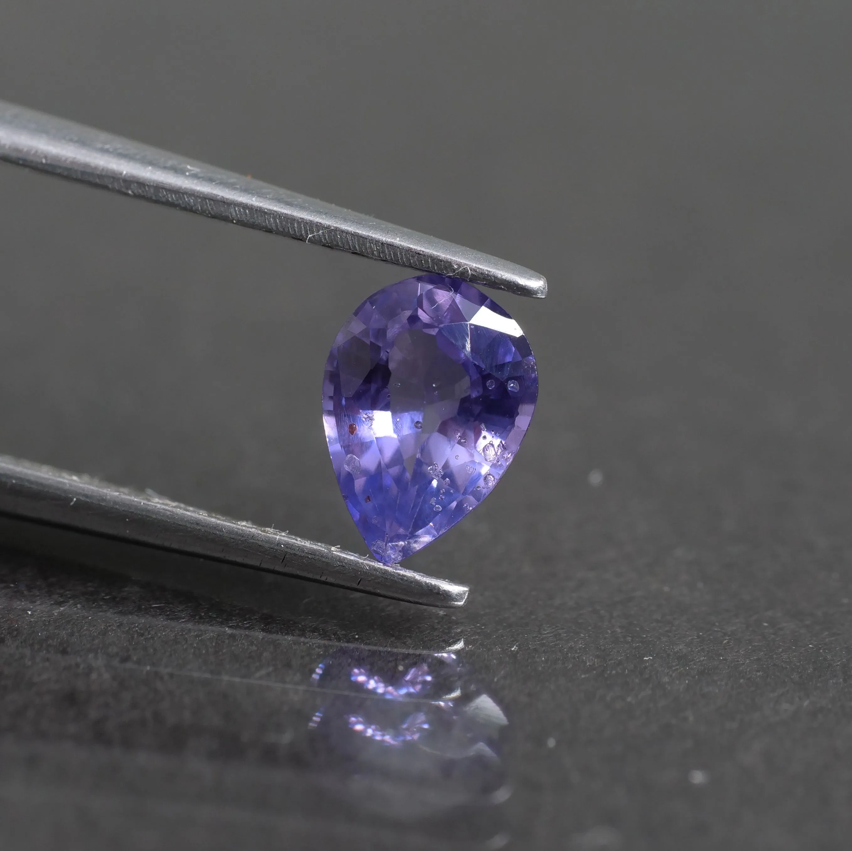 Sapphire | natural, purple, pear cut 7x5 mm, SI 0.8ct