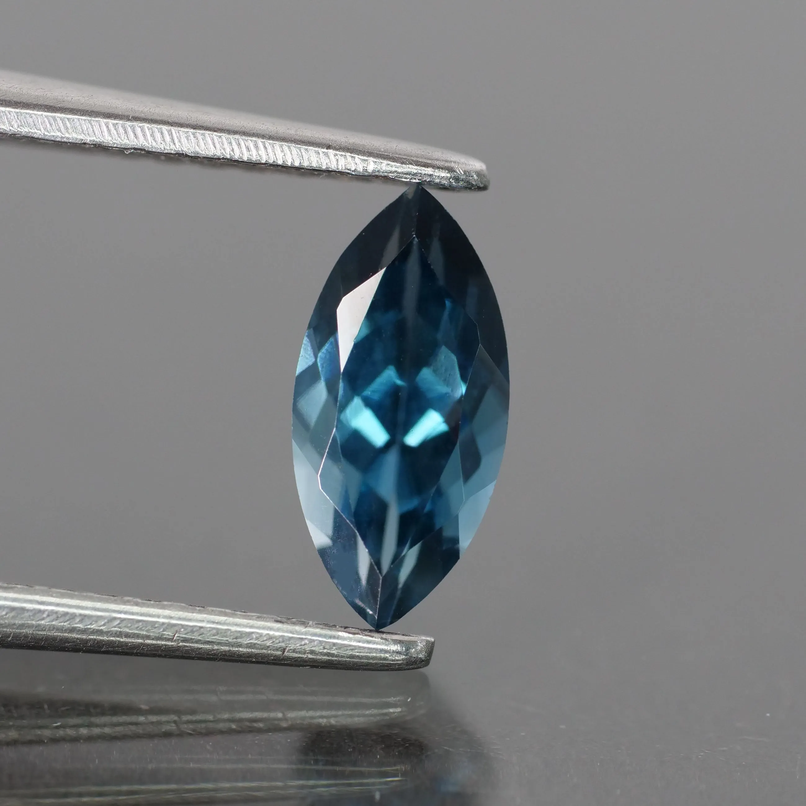 Topaz, teal blue, marquise cut VVS 8x4mm 0.70ct